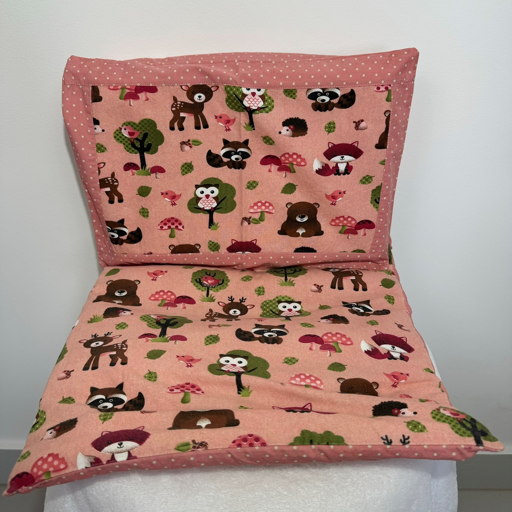 Colchonete e travesseiro de carrinho de bebê