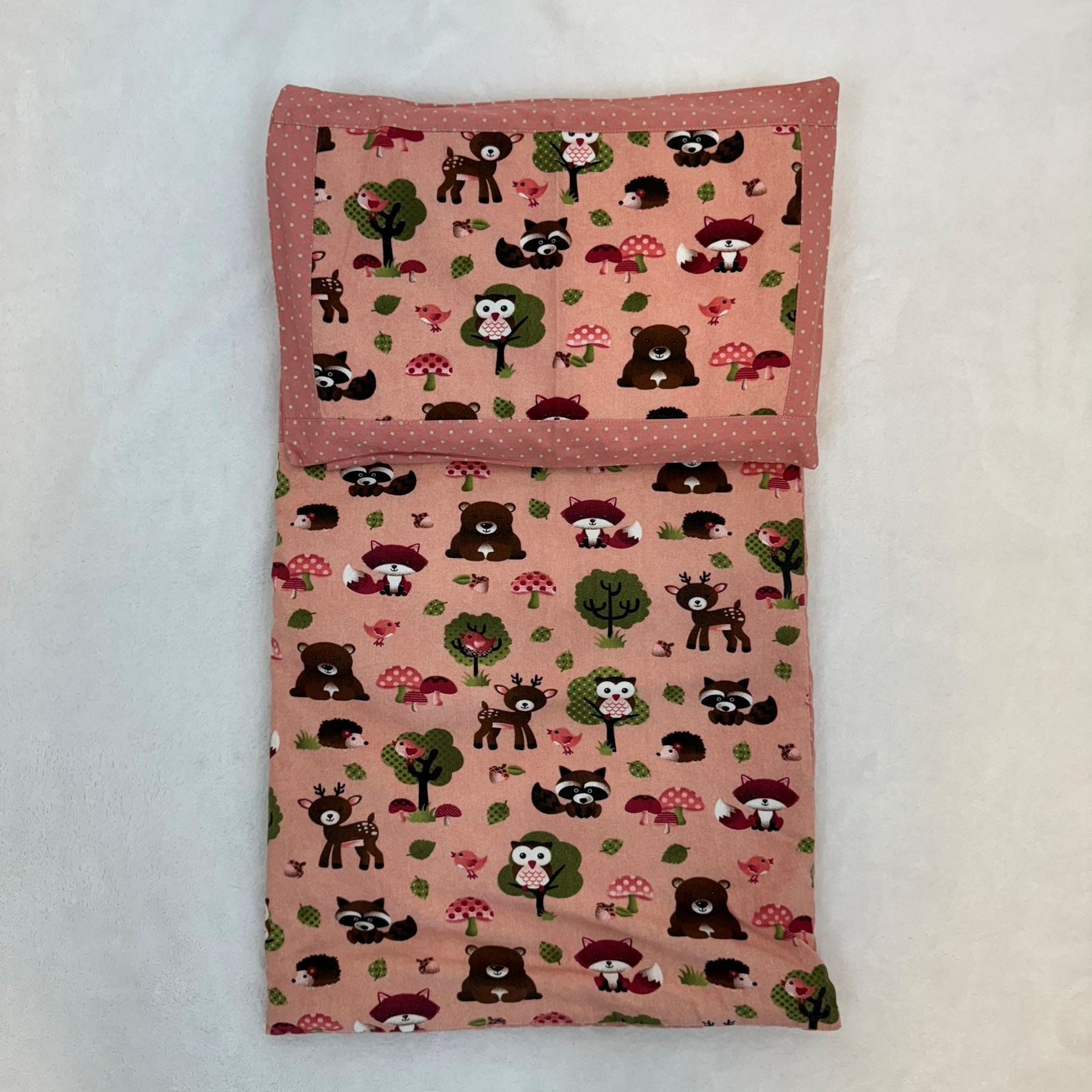 Colchonete e travesseiro de carrinho de bebê