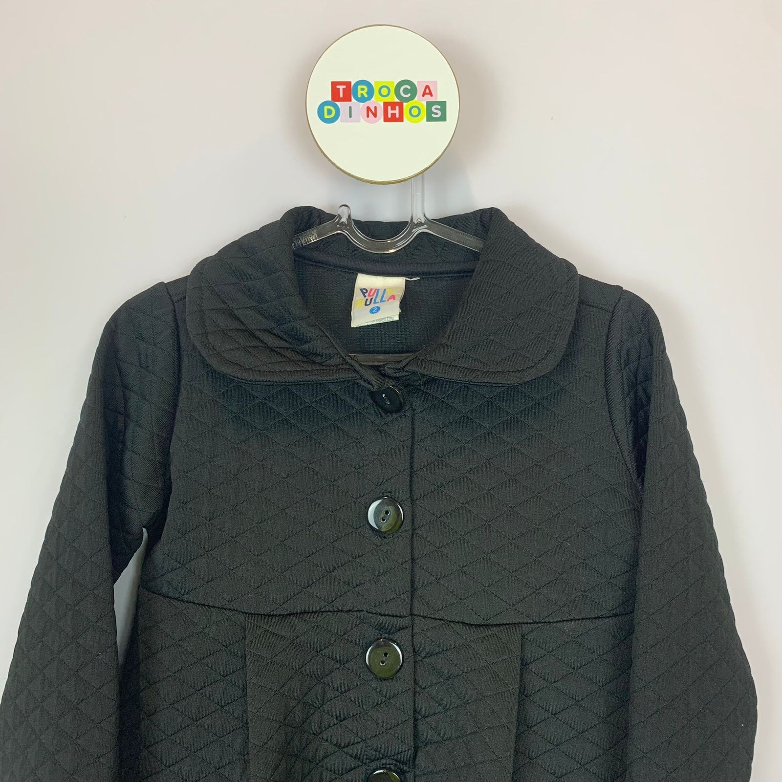 Sobretudo preto matelassê